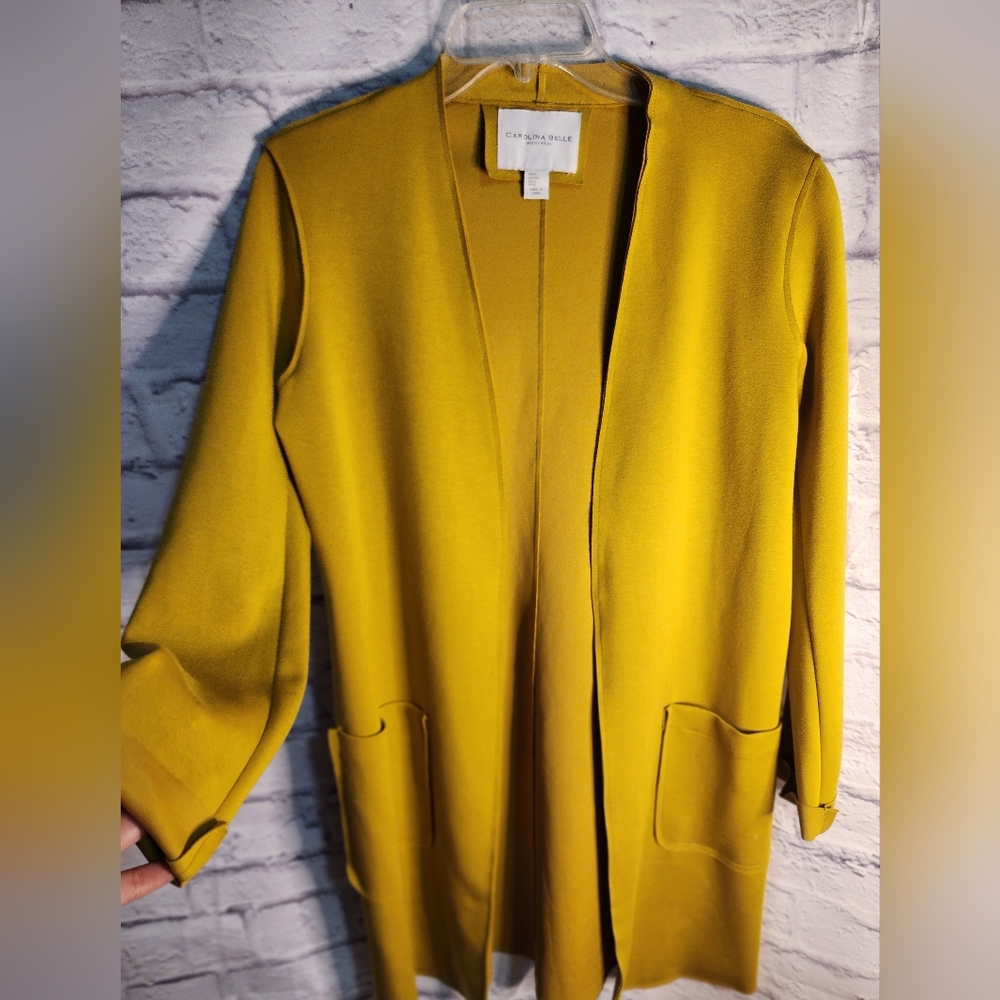 Small Carolina Belle Cardigan mustard yellow color. Stretch material.